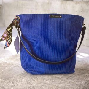 Sac cabas en velours côtelé avec anse en cuir porté épaule