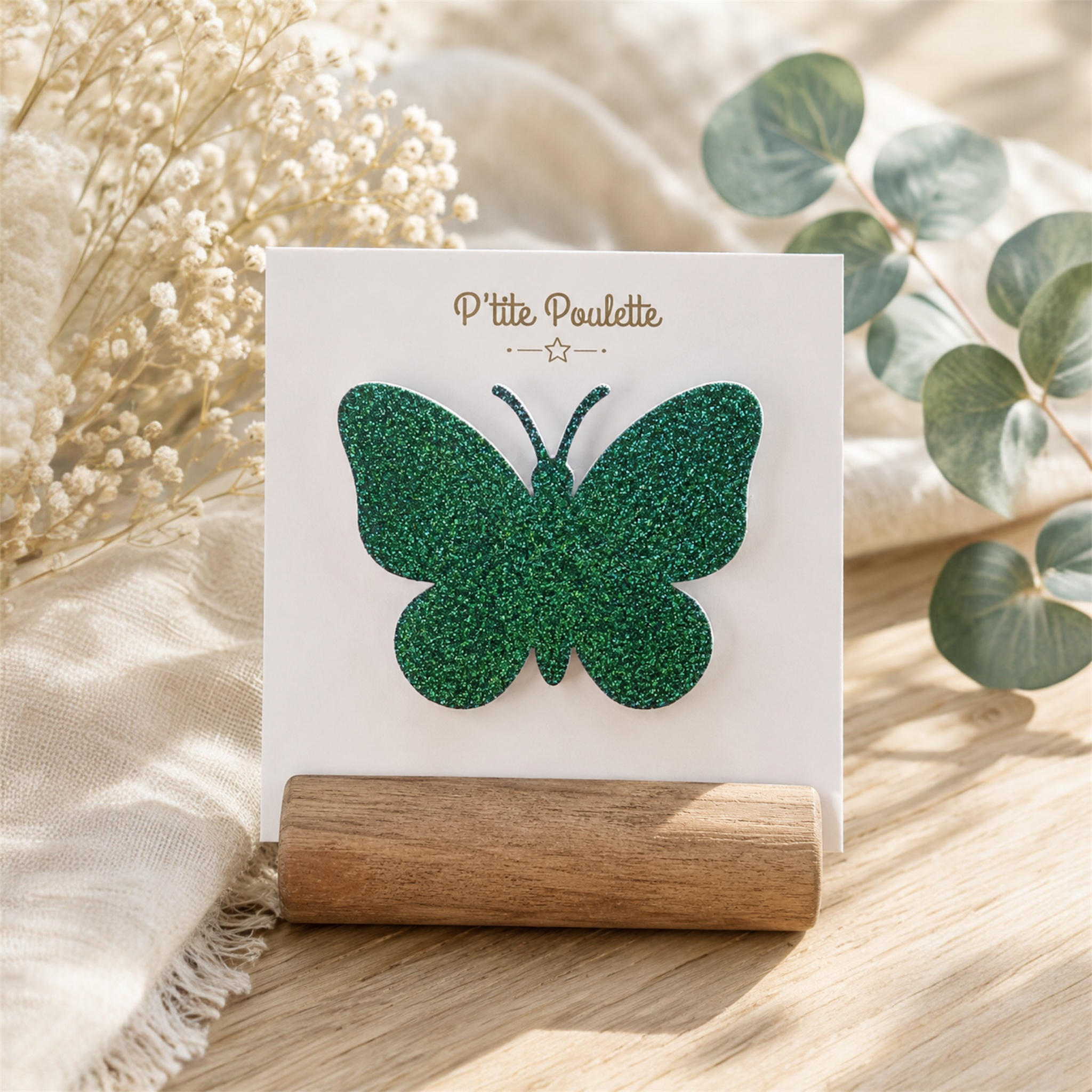 Broche papillon pailletée